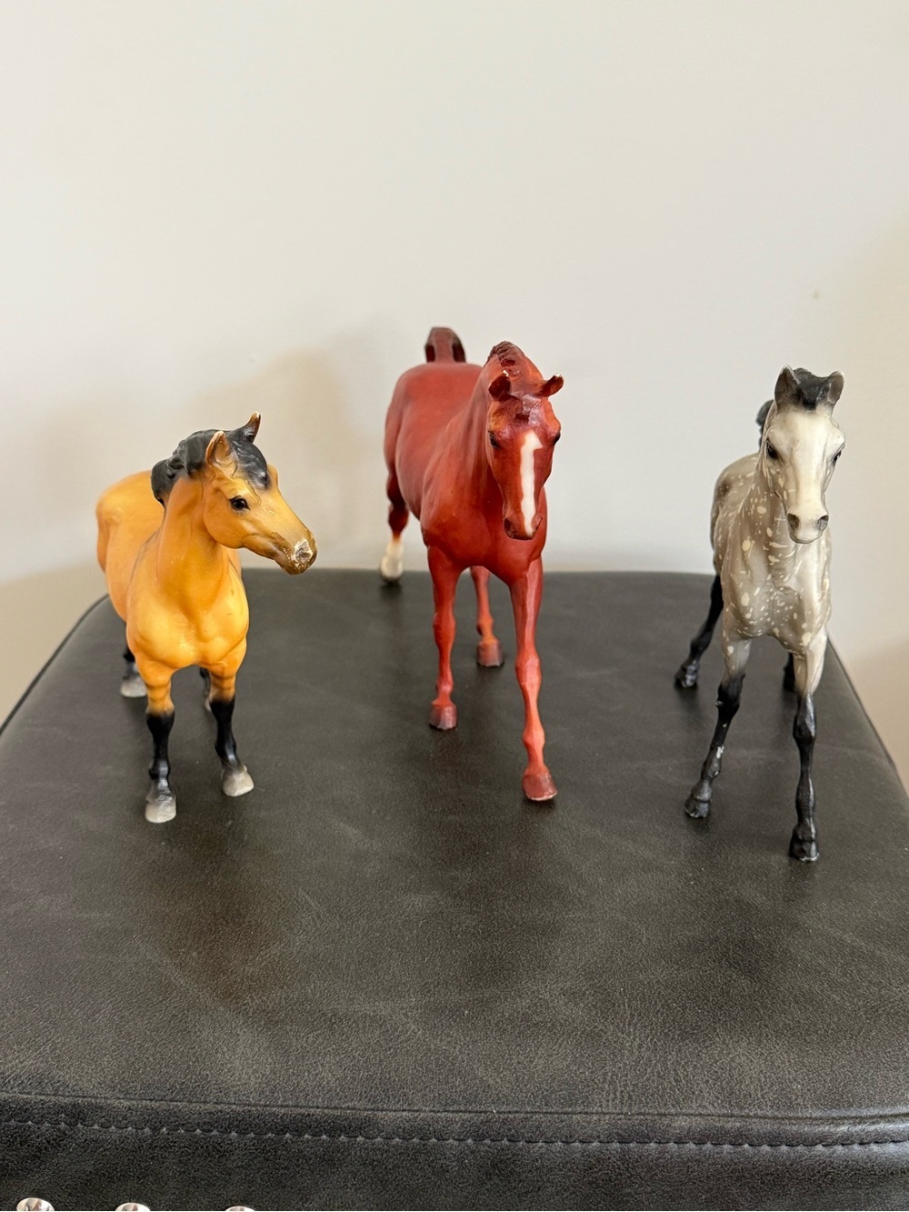 Three Collectible Breyer Toy Horses - Chestnut, Dapple Gray, and Palomino
